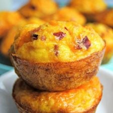 2 Hash Brown Egg Cups stacked on top of each other with more in the background