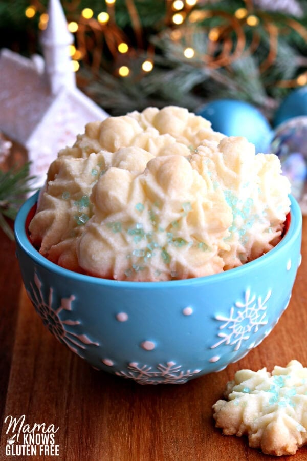 gluten-free almond spritz cookies in a blue bowl