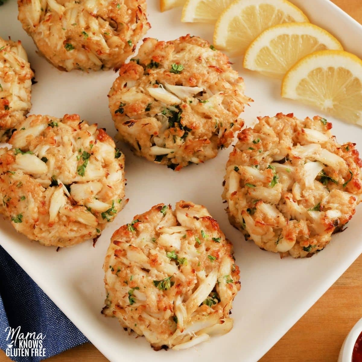 gluten-free crab cakes on a white platter