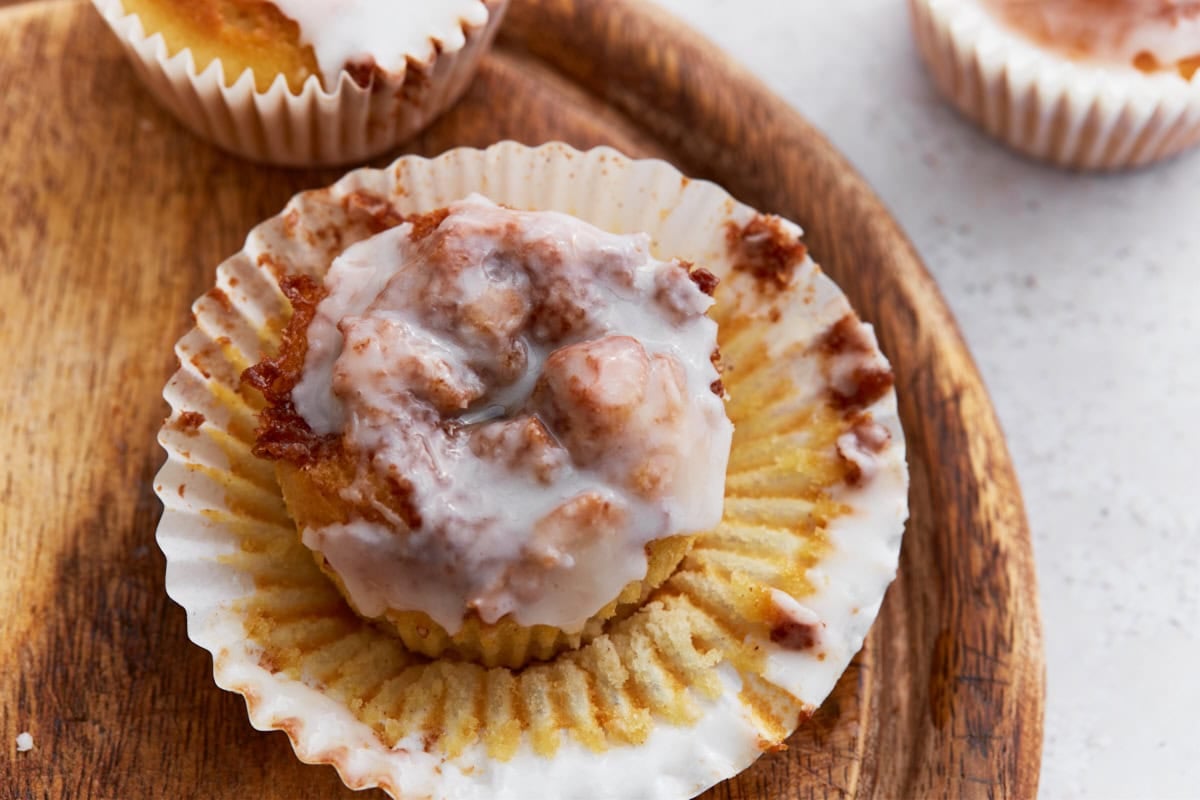 Gluten-free cinnamon roll muffins with gooey swirls, vanilla glaze, and no dough rolling—easy to make with simple pantry ingredients.