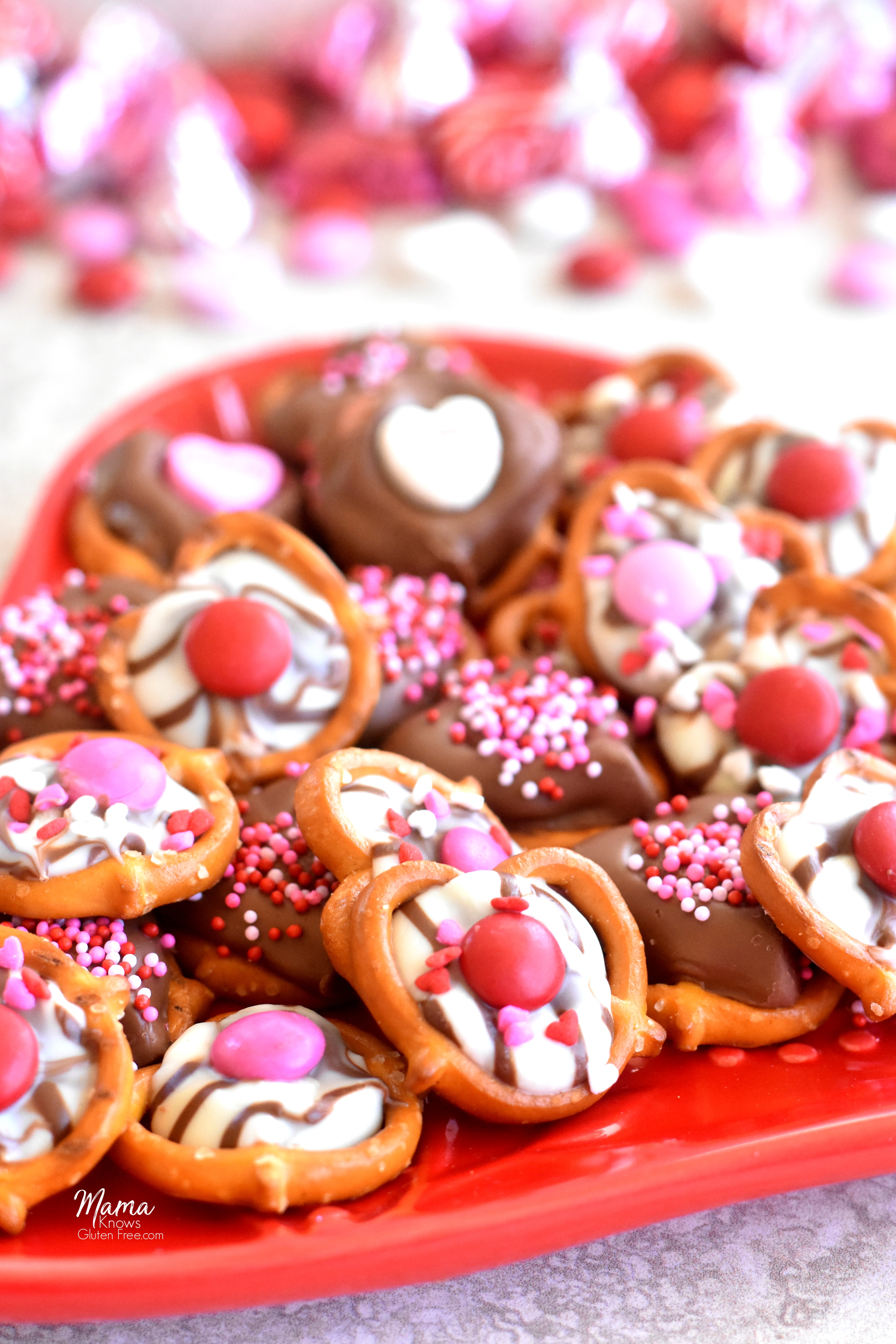 gluten-free chocolate covered pretzels for Valentine's Day on a heat shaped plate