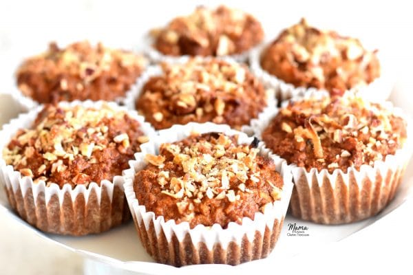 7 gluten-free carrot cake muffins on a cake pan