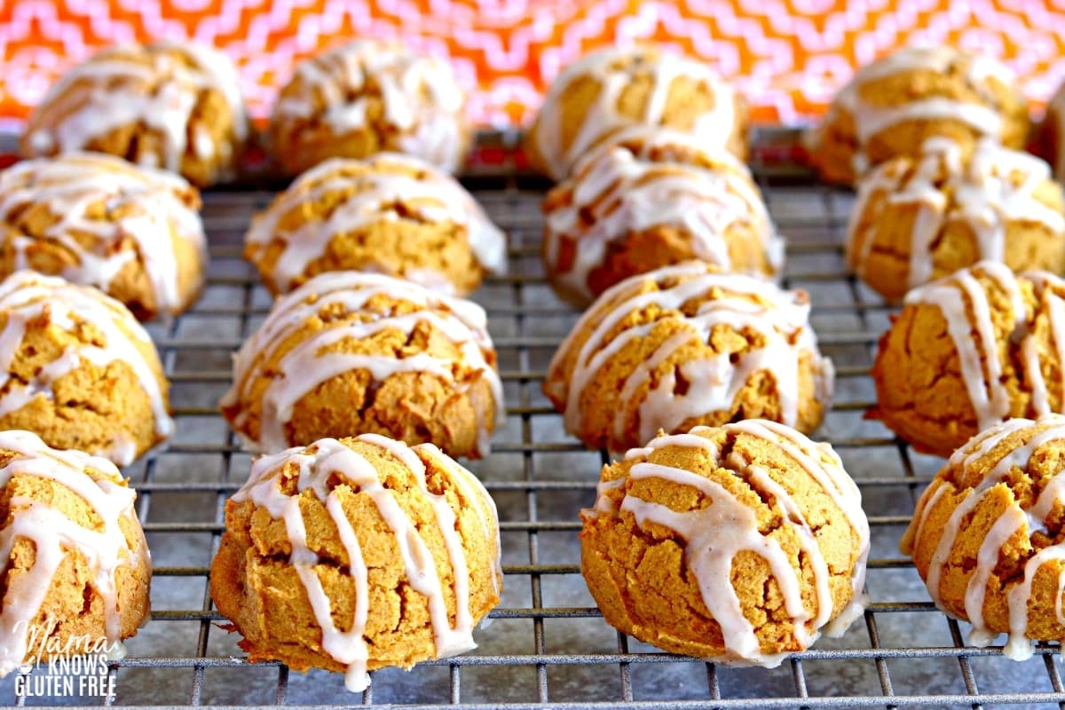 gluten-free pumpkin cookies on a sliver cooling rack