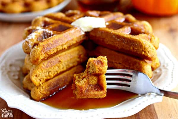 gluten-free pumpkin waffles with a bite on a fork