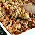 gluten-free stuffing with a wooden spoon