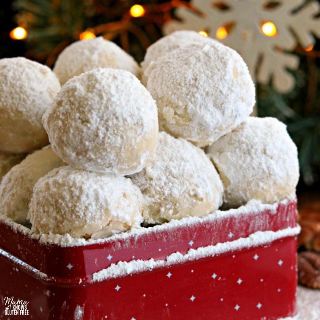 gluten-free snowball cookie sin a red cookie tin
