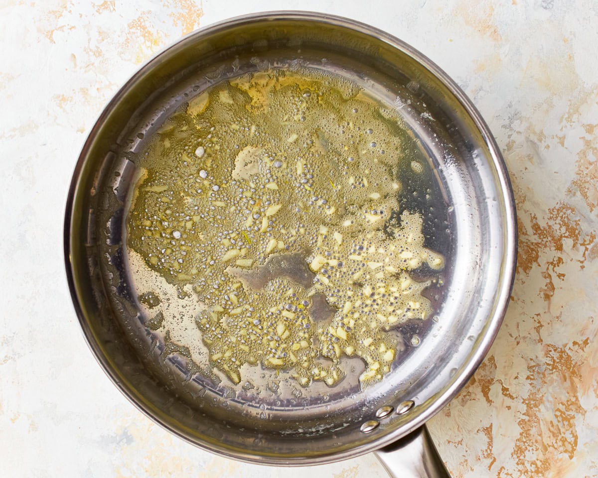 Butter and minced garlic in a saucepan