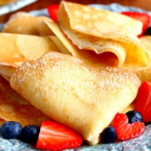 folded gluten-free crepes with strawberries and blueberries