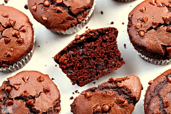 gluten-free chocolate muffins with one cut in half to show the texture