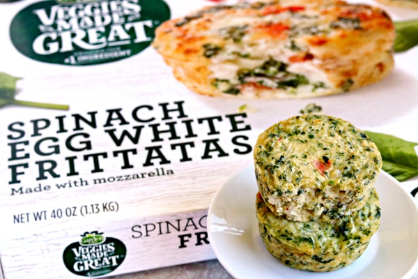 a plate with 2 Garden Lites spinach egg white Frittatas with the package in the background