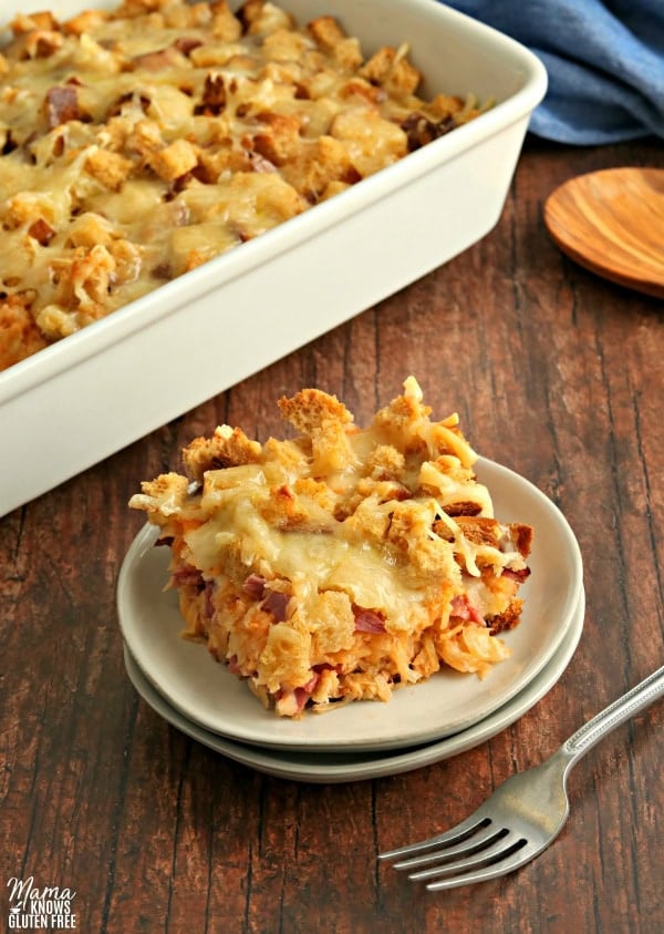 ruben casserole on plate with casserole in the background and fork 