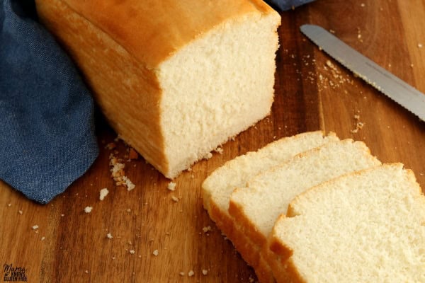 3 slices of gluten-free bread with the loaf