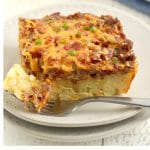 serving of gluten-free breakfast casserole on a white plate with a fork