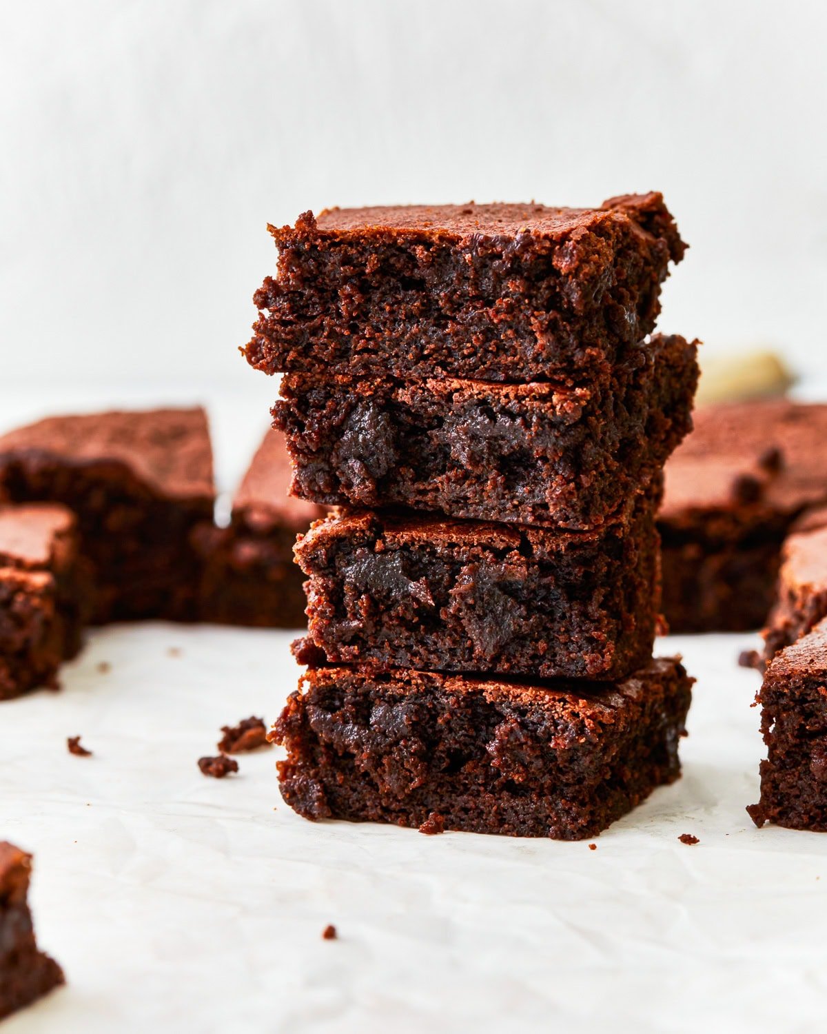 4 stacked gluten free brownies.