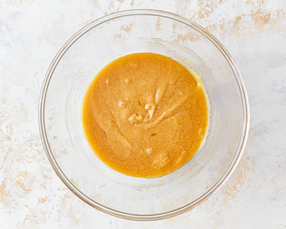 wet ingredients for gluten free brownies in a glass bowl.