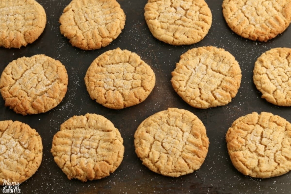 gluten-free peanut butter cookie son a dark baking sheet