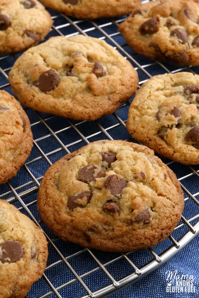gluten-free chocolate chip cookies on a sliver cooling rack