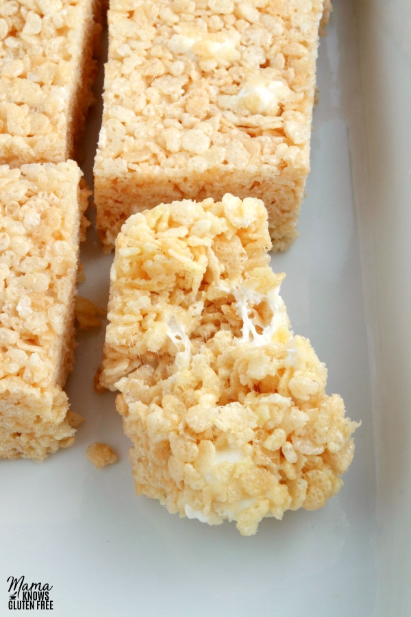 pan of gluten-free rice krispies treats with one broke in half to see the texture