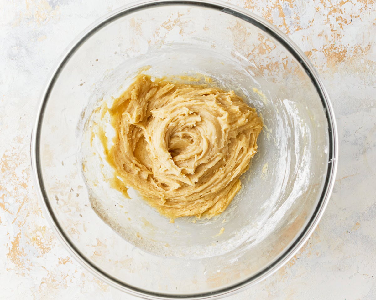 thick batter in a glass bowl.