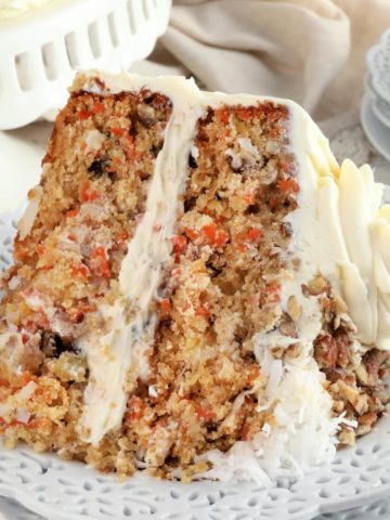 gluten-free carrot cake slice on a white plate