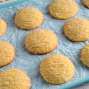 gluten-free lemon cookies on a blue cookie sheet