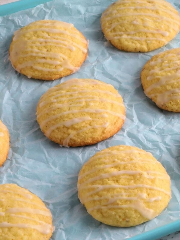 gluten-free lemon cookies on a blue cookie sheet