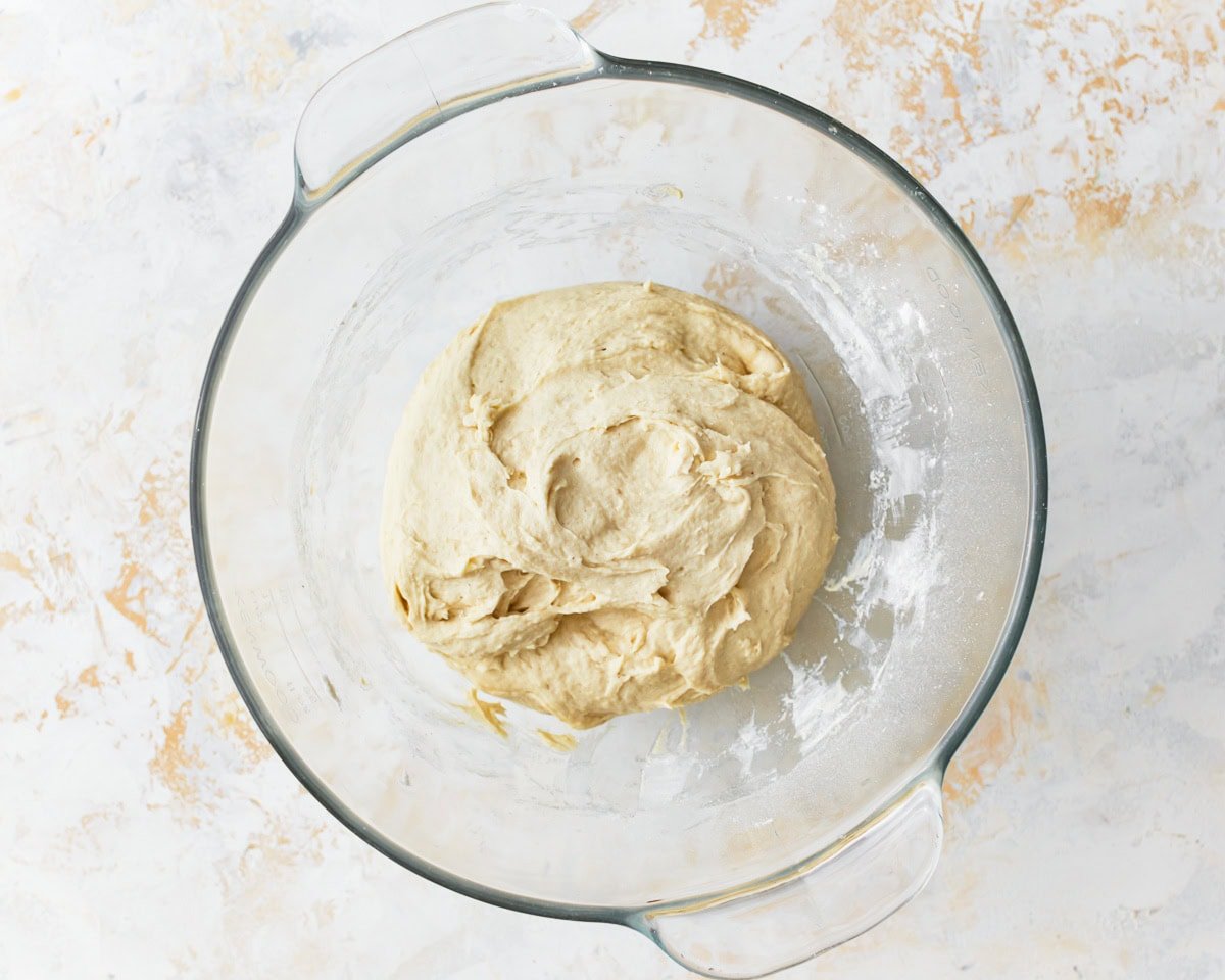 gluten-free focaccia dough in a glass bowl.