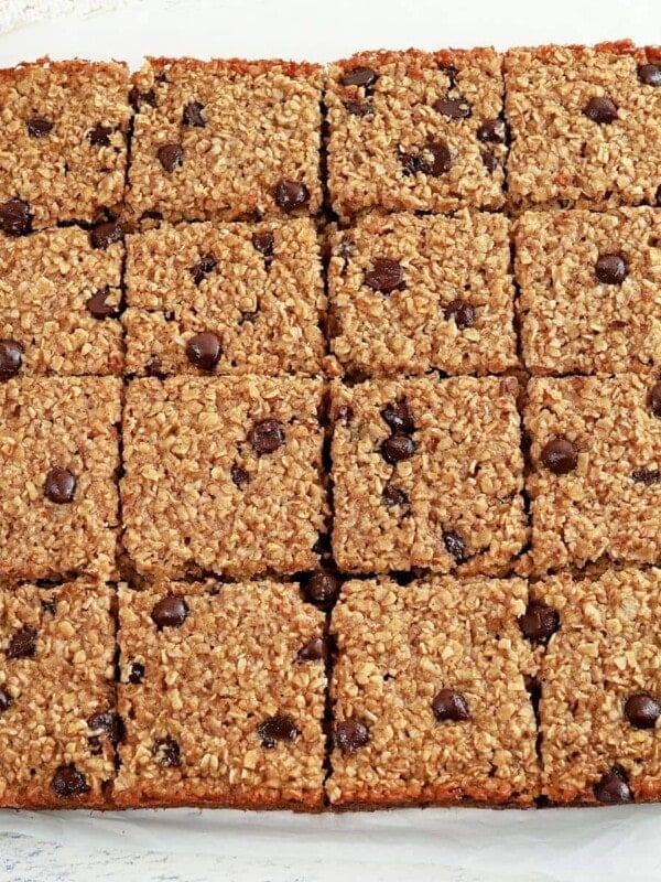 oatmeal bars sliced into squares on a white background