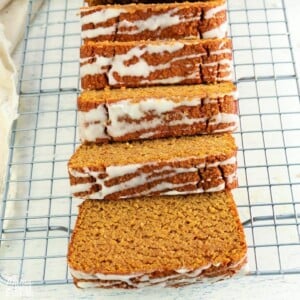 almond flour pumpkin bread sliced on a sliver cooling rack