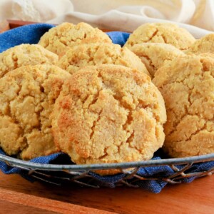 almond flour biscuits in a blue napkin lined basket