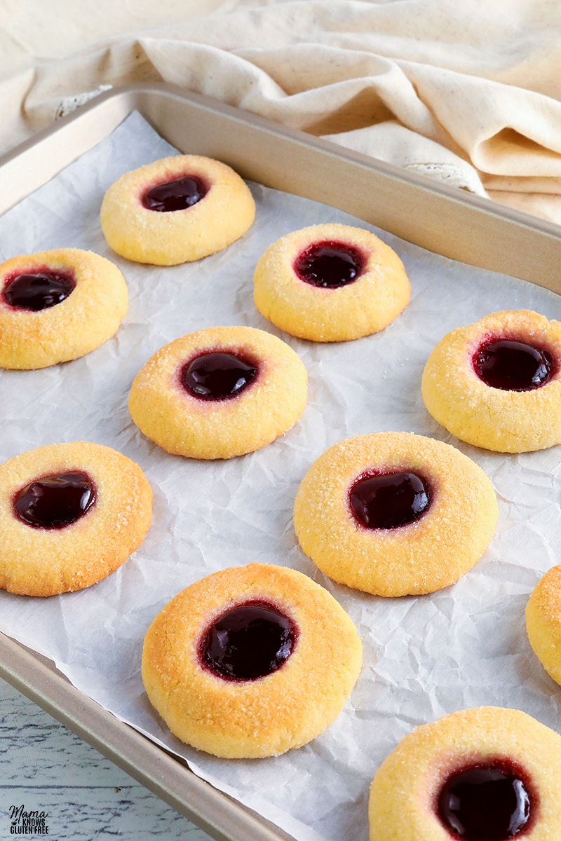 gluten-free thumbprint cookies on a baking sheet
