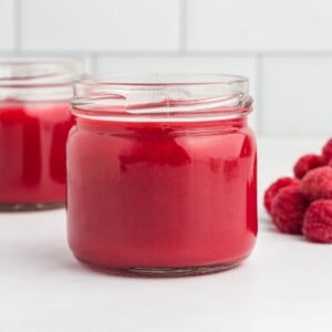 Raspberry coulis in a jar