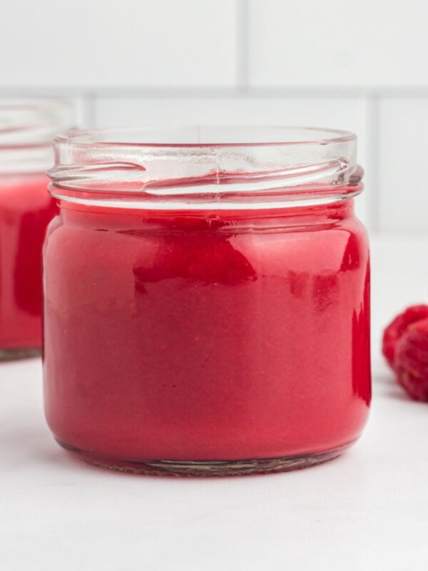 Raspberry coulis in a jar