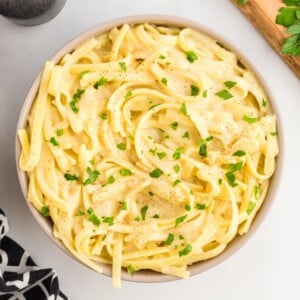 dairy-free alfredo sauce over pasta in a bowl