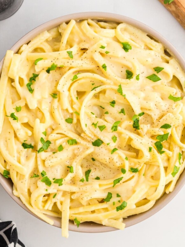 dairy-free alfredo sauce over pasta in a bowl