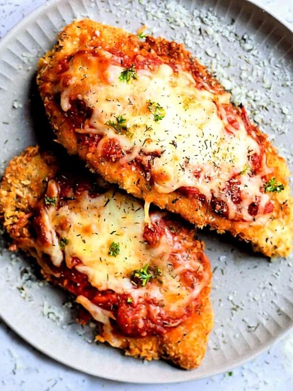 gluten-free chicken parmesan on a white plate