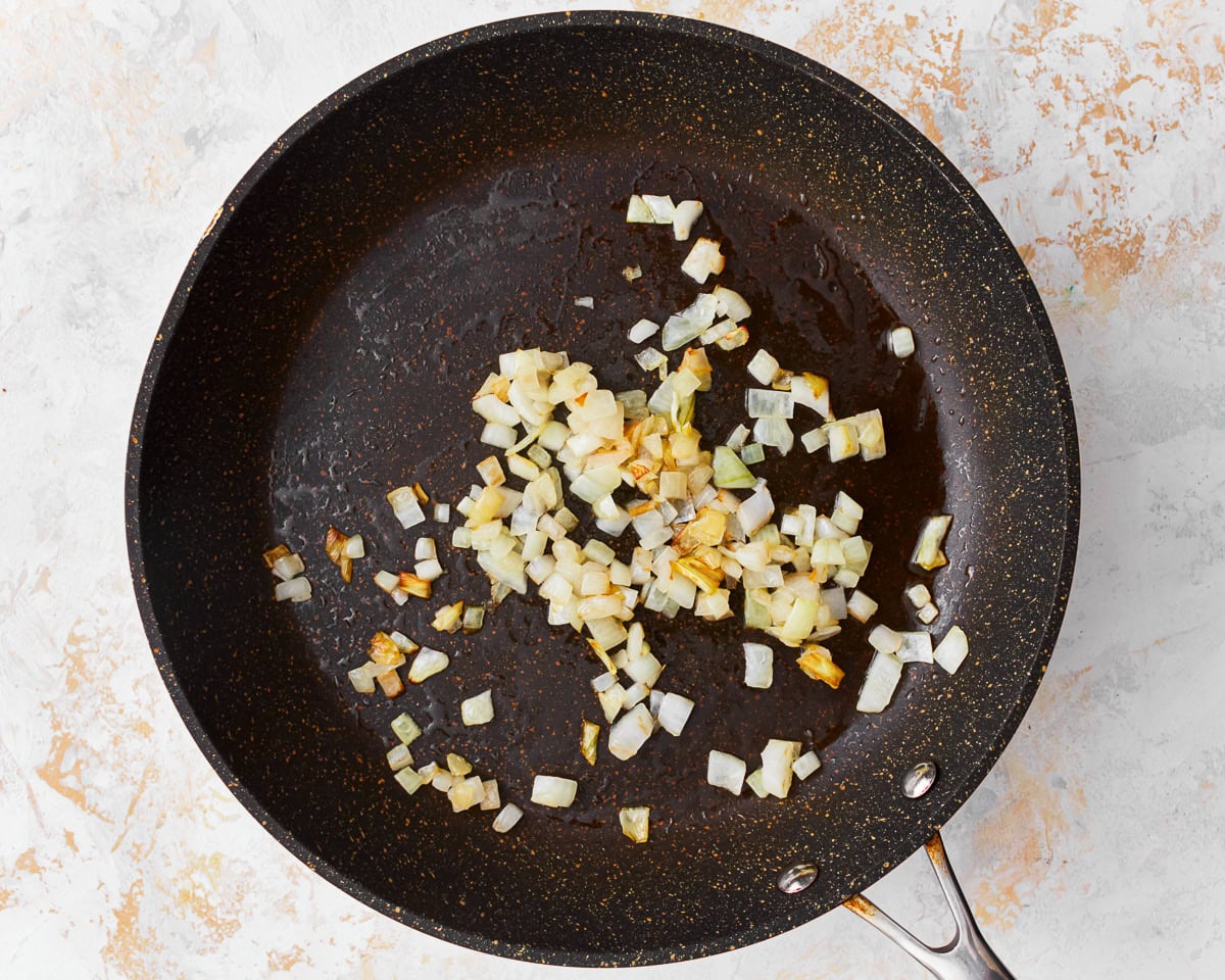 Diced onions in a skillet