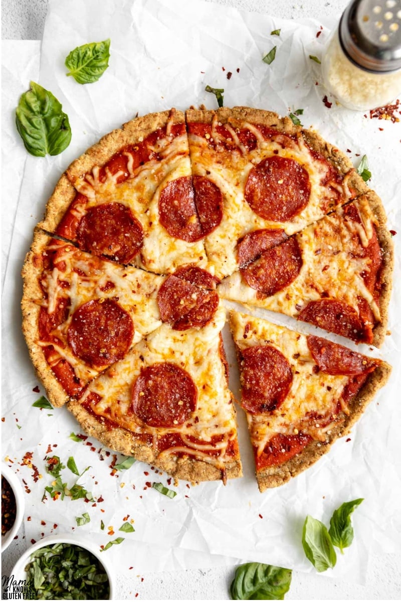 Pepperoni pizza baked using a Gluten-Free Almond Flour Pizza Crust sliced.