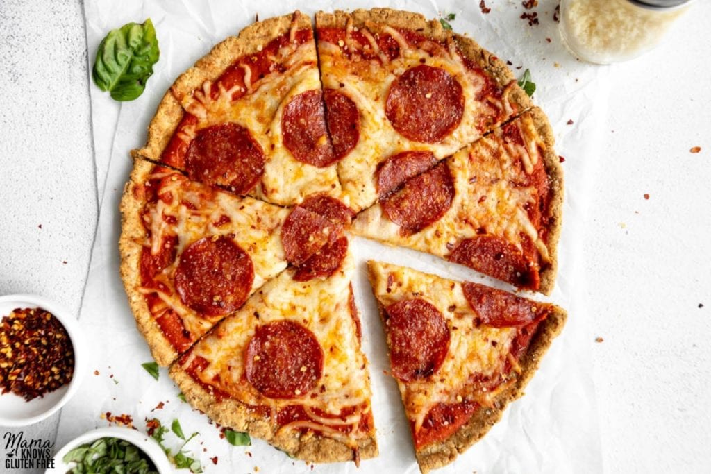 Sliced pepperoni pizza made using almond flour pizza crust