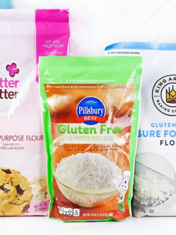 three gluten-free flour brands on a white counter