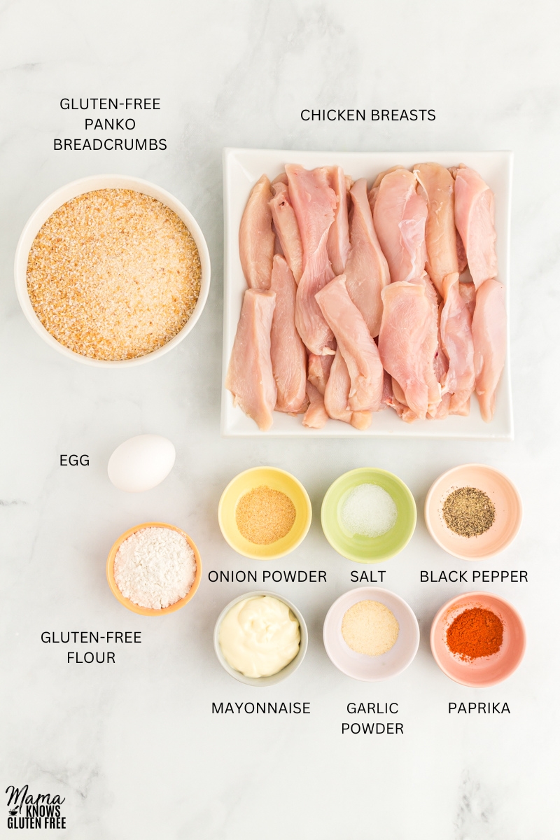 Ingredients for Gluten-Free Chicken Tenders measured out in bowls and plates.