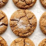 gluten-free molasses cookies on white parchment paper