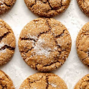 gluten-free molasses cookies on white parchment paper