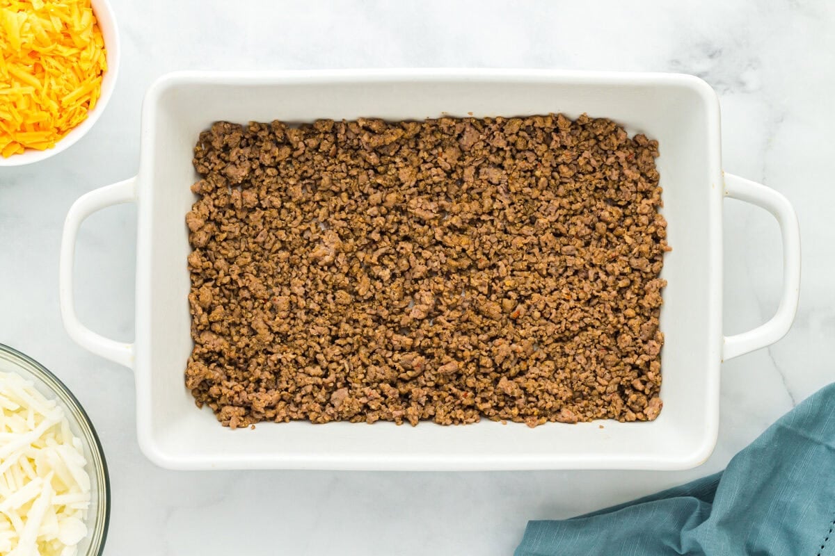 cooked ground sausage in a baking pan.