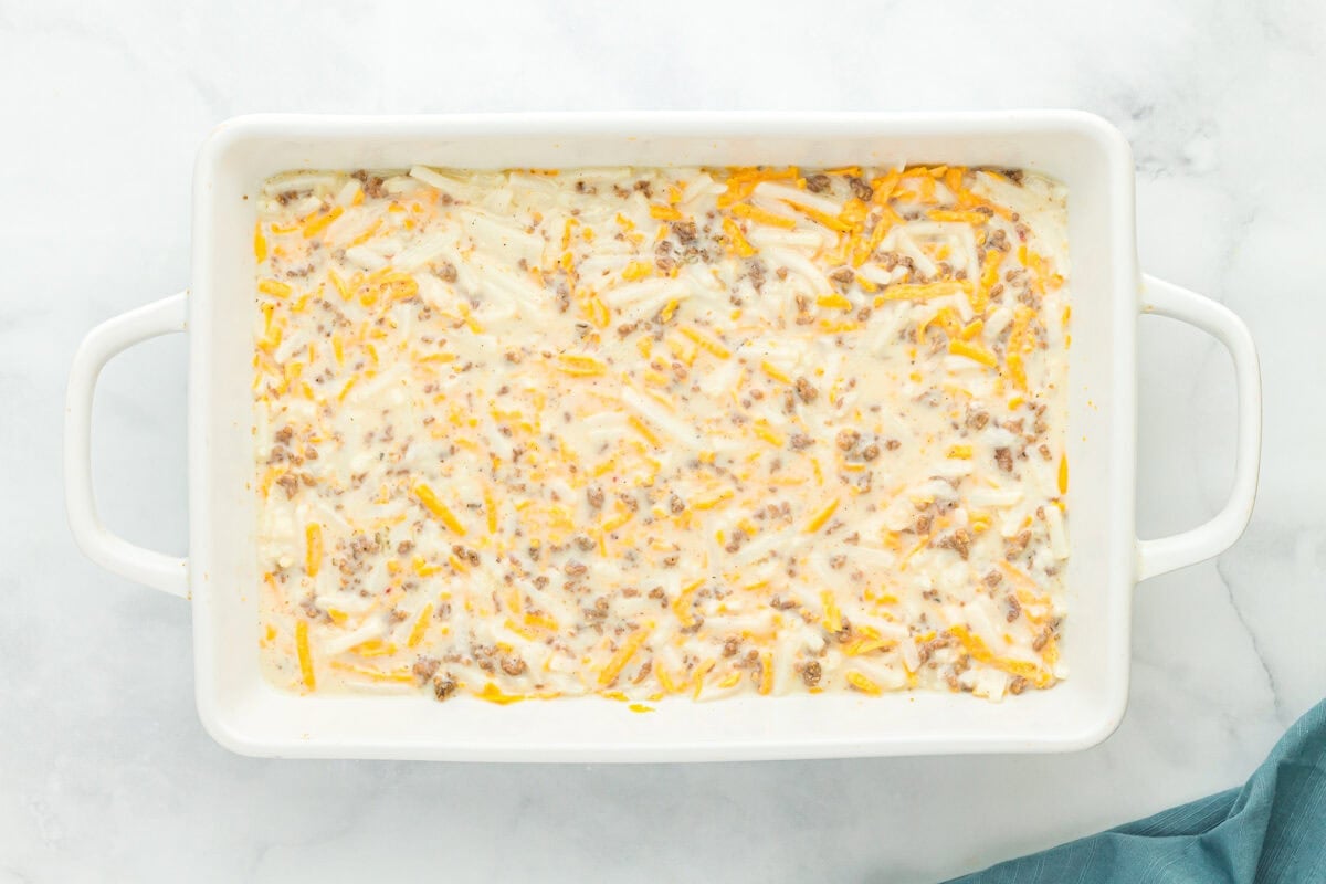 unbaked gluten-free breakfast casserole in a baking pan.