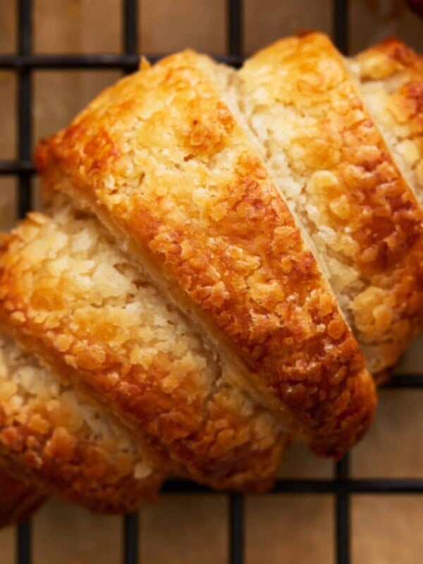 gluten-free croissant om a black cooing rack