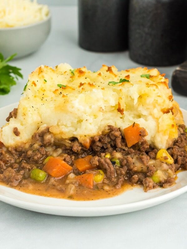 gluten free shepherds pie serving on a white plate.