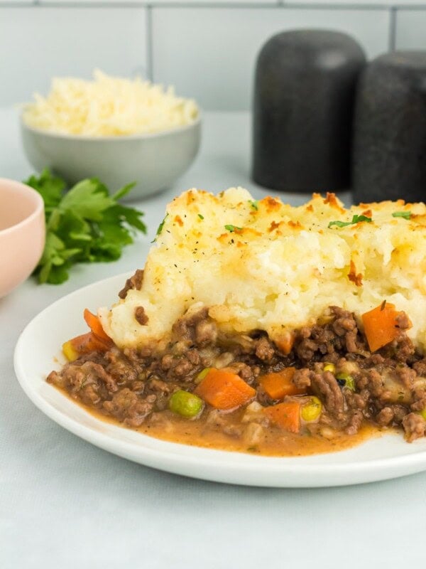 gluten free shepherds pie serving on a white plate.