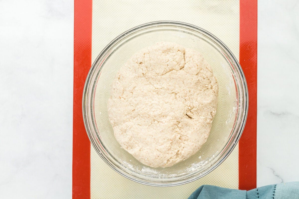 gluten-free sourdough bread dough in a glass bowl.