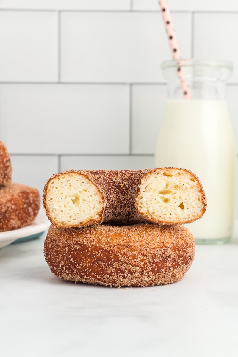 stacked yeast donuts with cinnamon sugar